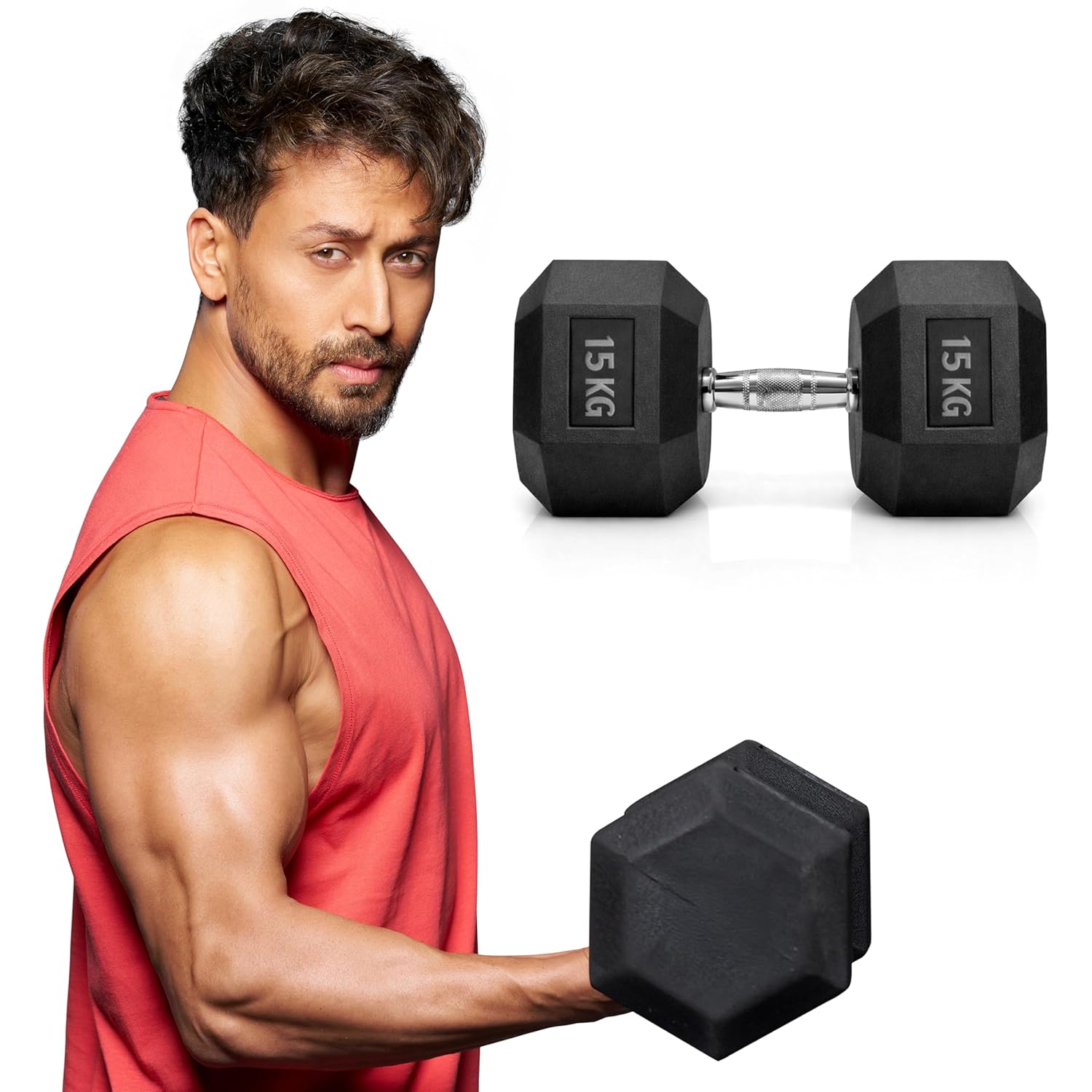 Tiger Shroff holding a pair of black Hexa dumbbells with '15 KG' marking on a white background