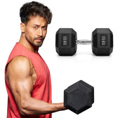Tiger Shroff holding a pair of black Hexa dumbbells with '15 KG' marking on a white background