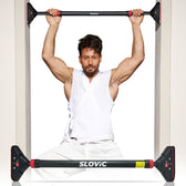 Tiger shroff exercising with a black and red SLOVIC pull-up bar on a white background