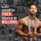 Tiger shroff with a Slovic thera band  over his shoulder in front of a collage of people exercising, with Slovic branding.